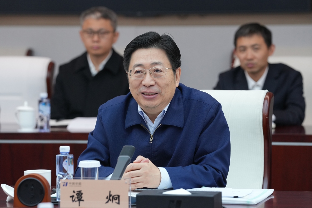 温枢刚会见国家开发银行行长谭炯-3