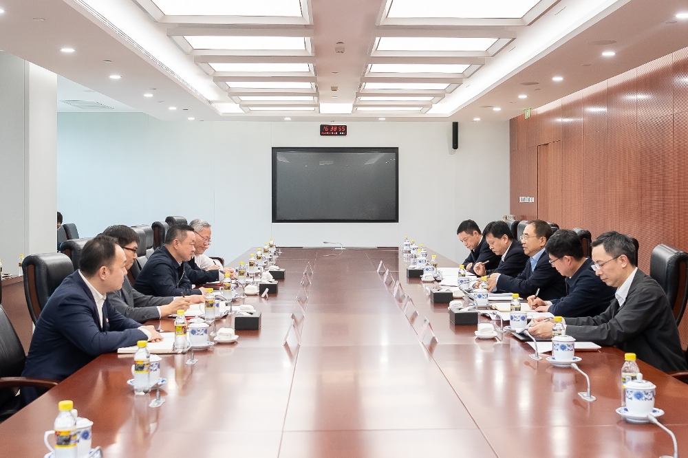 邹磊会见中国国新党委书记、董事长徐思伟-1