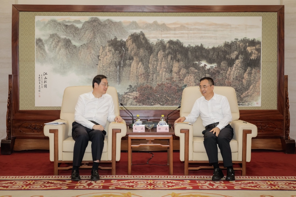 邹磊会见陕西省委常委、常务副省长王晓-1